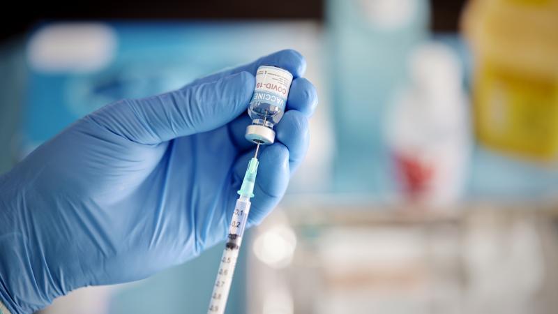 COVID vaccine shot 