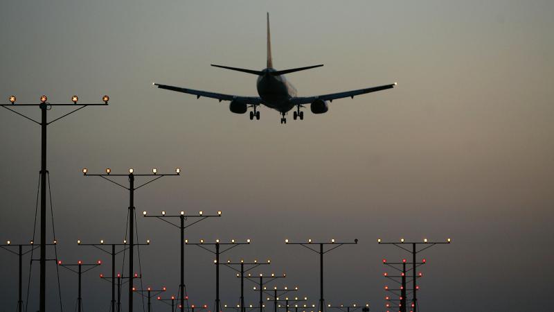 April 15, 2008.  A jet comes in for landing at Los Angeles International Airport (LAX) on April 15, 2008 in Los Angeles, California
